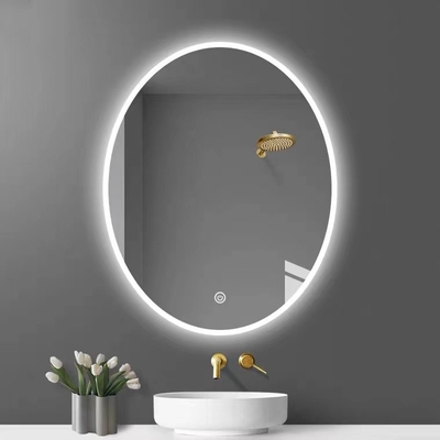 Miroir de coiffeuse fixé au mur en verre de forme ovale avec l'écran de désembuage